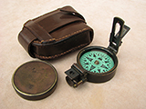 Unusually small 19th century Francis Barker green card prismatic compass 